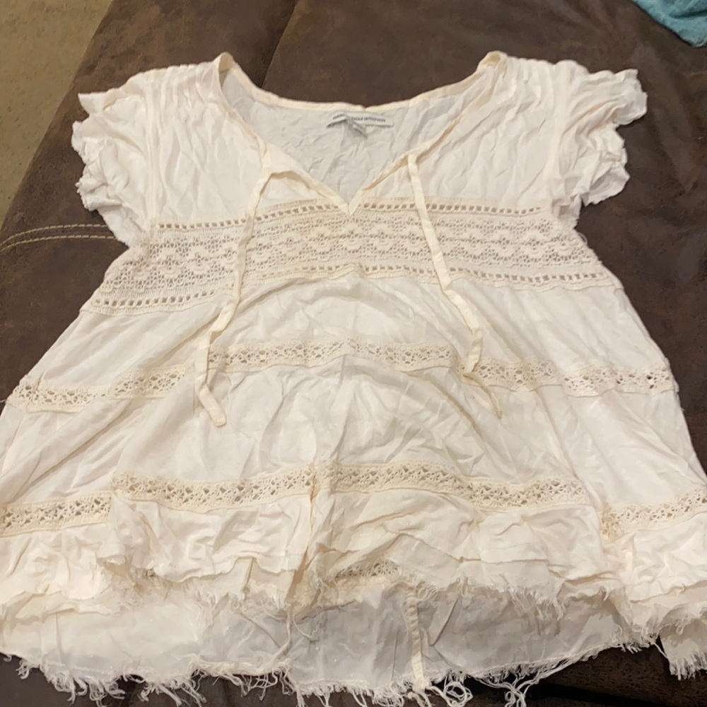 White flowy top